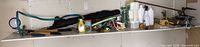 Shelf containing all listed garden items
