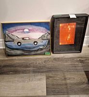 Both framed prints side by side showing sizes and frames