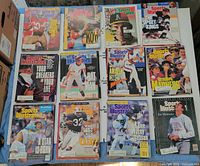 Tabletop view showing twelve of the 1990 Sports Illustrated magazine covers