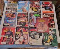 All 35 Sports Illustrated 1991 issues arranged on table showing covers