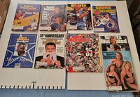 All visible 1995 Sports Illustrated magazines laid out, showing covers including Super Bowl, NBA, MLB strike, Swimsuit and 35th Anniversary editions