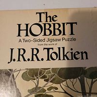 Close-up of The Hobbit puzzle box title and artwork