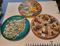 All three round Springbok puzzle boxes front view