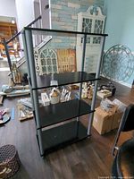 Front view of assembled 4-tier bookshelf showing overall design and color