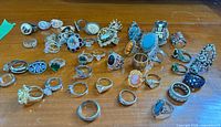 Full spread of all assorted rings laid out on table