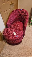 Chair and ottoman together showing upholstery and fringe