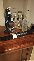 Overall shot showing lever corkscrew, three decanters and Patriot bar mat