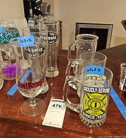 Group shot of all glasses showing variety and logos
