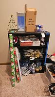 Full lot on shelving unit with gift wrap rolls