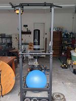 Overall view showing power tower, punching bag, stability ball