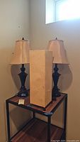 Overall view of all three lamps on small table