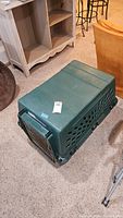 Overall view of green Petmate crate top and side