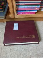 Closed burgundy Reader's Digest binder, cover title visible