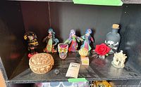 Full shelf view showing all figurines and decor