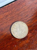 Reverse side showing St George on horseback, date 1935 visible