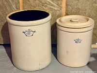 Both crocks side by side showing blue crown marks