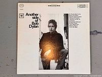 Front cover showing album title, artist, portrait photo, and Columbia logo