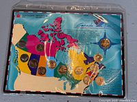 Full view of map card with all thirteen quarters in sleeve