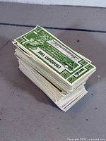 Side view of stacked Canadian Tire coupons