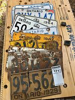 Stack of six Ontario plates on work surface