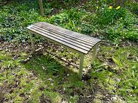Full view of bench in garden