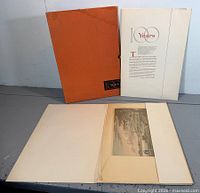 Portfolio cover, title page and one mounted lithograph displayed