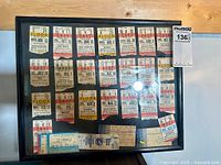 Front view of entire framed ticket stub collection