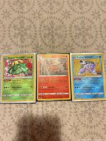 Overview showing all three Pokémon GO cards: Radiant Venusaur, Charizard, Radiant Blastoise