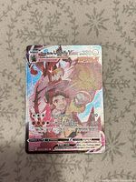 Front view of Pokémon Single Strike Urshifu VMAX rainbow holo card