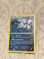 Front of Umbreon XY96 promo card showing artwork, stats and foil effect