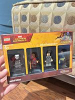 Front of sealed LEGO Marvel Super Heroes Limited Edition minifigure set showing four figures in window.