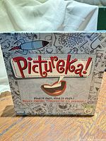 Front of sealed Pictureka! box