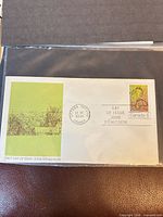 Full view of First Day Cover envelope with stamp and postmark