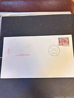 Full view of unaddressed First Day Cover showing cachet, stamp and cancel