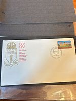 Full view of FDC showing stamp, crest, cancellation