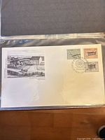 Full view of First Day Cover in sleeve showing stamps and cachet