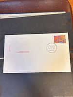 Full view of first day cover with stamp and postmark