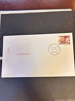 Full view of FDC showing stamp, cancel and embossed maple leaf