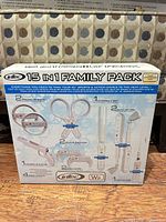 Front of boxed Intec 15 in 1 Family Pack showing item illustrations and contents list