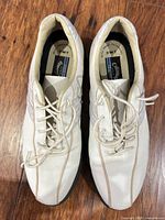 Top view of both shoes showing laces, color, and general wear