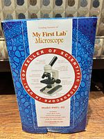Retail box showing My First Lab Microscope branding and model information