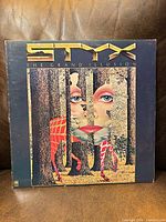Front cover of Styx The Grand Illusion LP