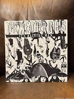 Front of picture sleeve showing title and artwork