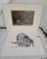 Overall view of both prints showing Beckendorf turkey print and matted church interior print