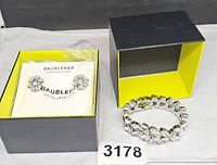 Bracelet, earrings in boxes overall view