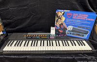 Overall lot showing Casio keyboard and boxed Nady microphone system