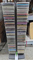 Full view of two-column rack filled with CDs