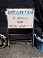 Front view of the Golf Cart Rules sign showing all text and metal frame