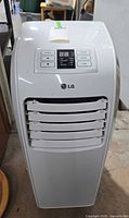 Front view showing LG logo, front louvers and overall condition