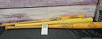 Three Louisville Slugger wood bats full length